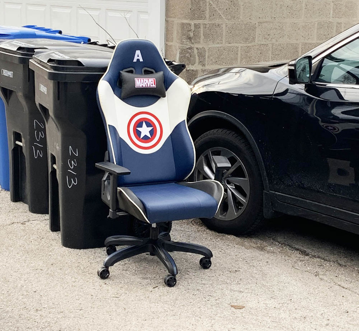 Perfect gaming chair on the side of the road.