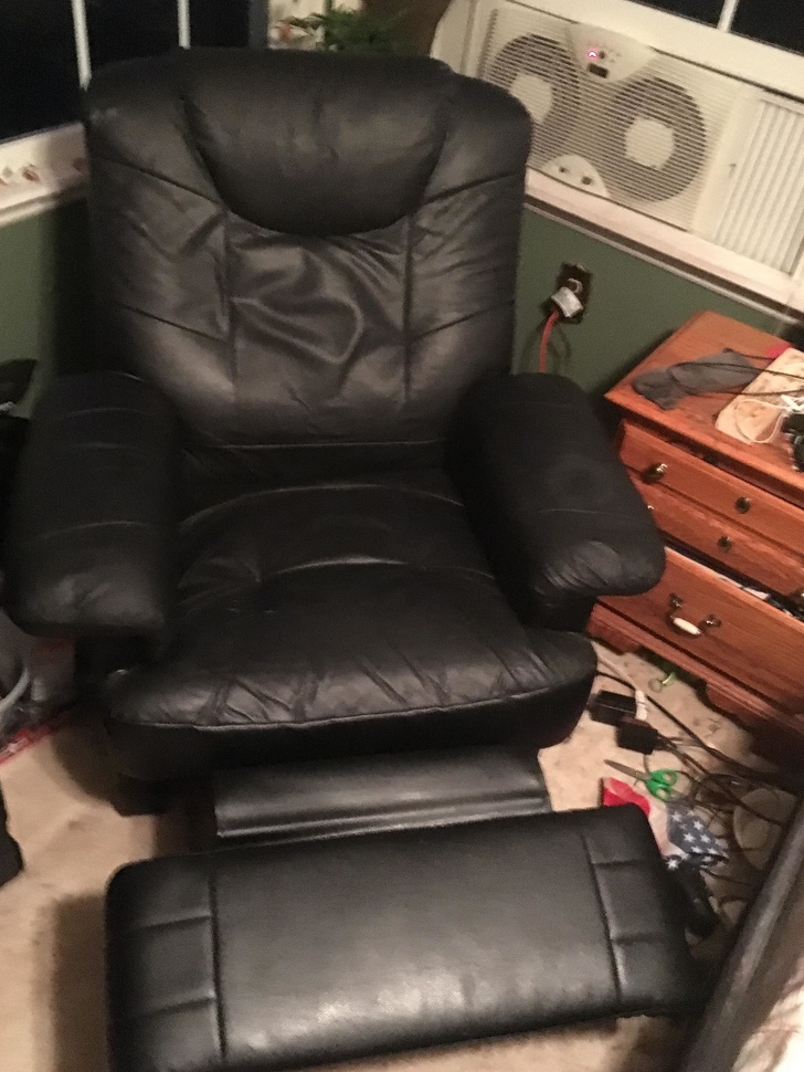 Leather recliner with massage settings.