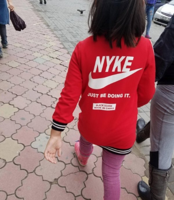 t shirt - Nyke Just Be Doing It. Black Score Nade In China