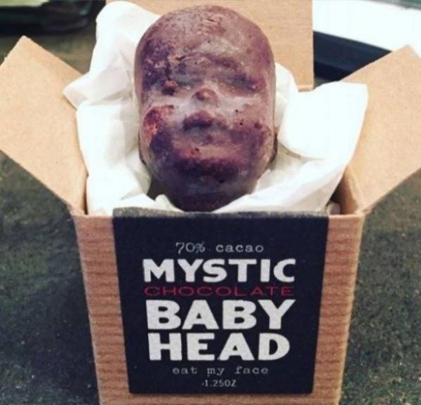 cursed images - photo caption - 70% cacao Mystic Baby Chocolate Head eat my face 1.250Z