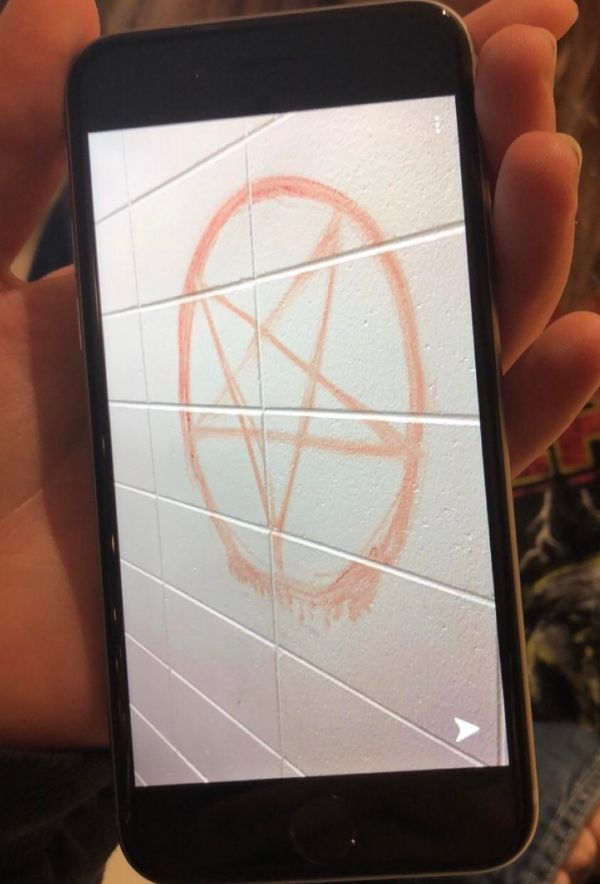 Pentagram drawn with period blood.