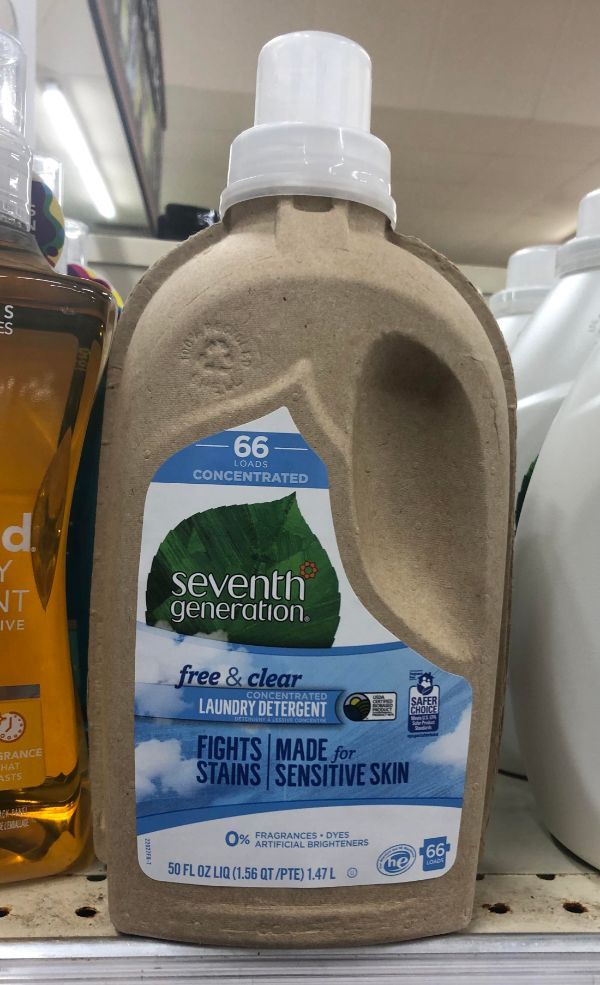 Detergent in a cardboard bottle.