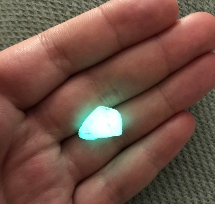 “Found this in the Israeli desert, anybody know what kind of rock it is? It glows when charged with any type of light.” Green calcite.