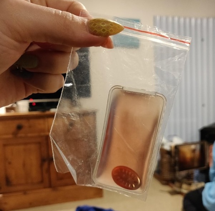 “This weird sealed pouch inside a baggie filled with some sort of gel and a metal oval with raised lines on it randomly appeared inside someone’s backpack in New Zealand.” Reusable hand warmer.