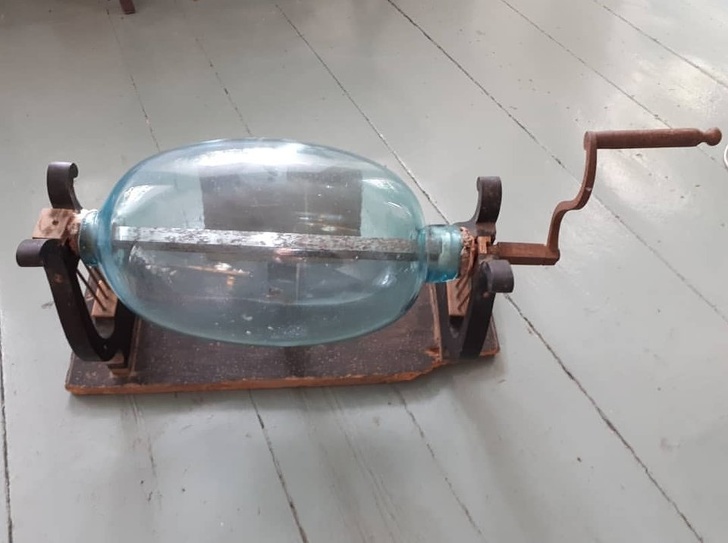 “This was found in a storage room at a nearby castle from the 17th century. Any suggestions?” Generator to produce static electricity.