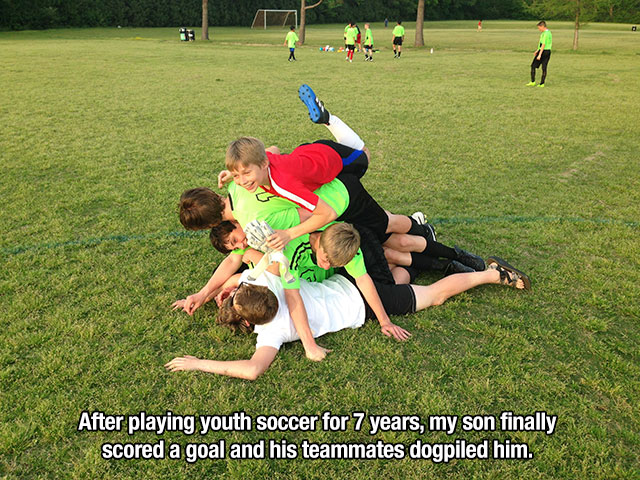 grass - After playing youth soccer for 7 years, my son finally scored a goal and his teammates dogpiled him.