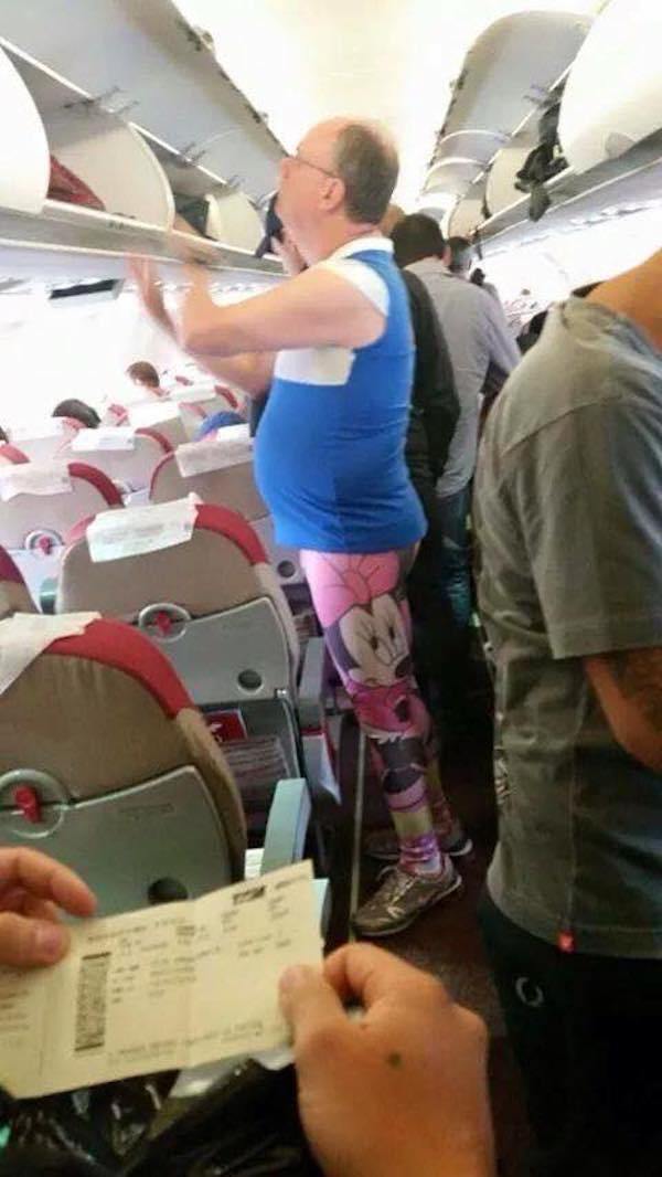 wtf man in minnie leggings on plane