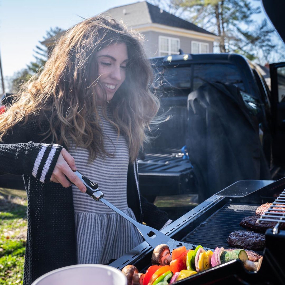 Drinking beer and grilling food in a parking lot is a party known as tailgating.