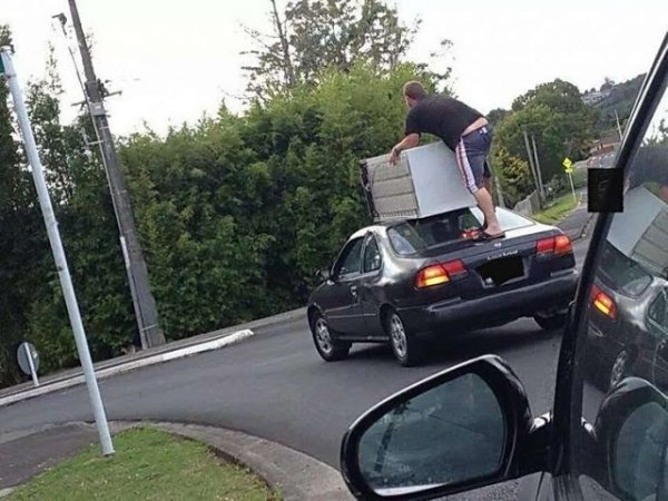 living their best life - moving furniture on a car