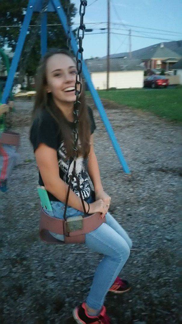 girl stuck in baby swing