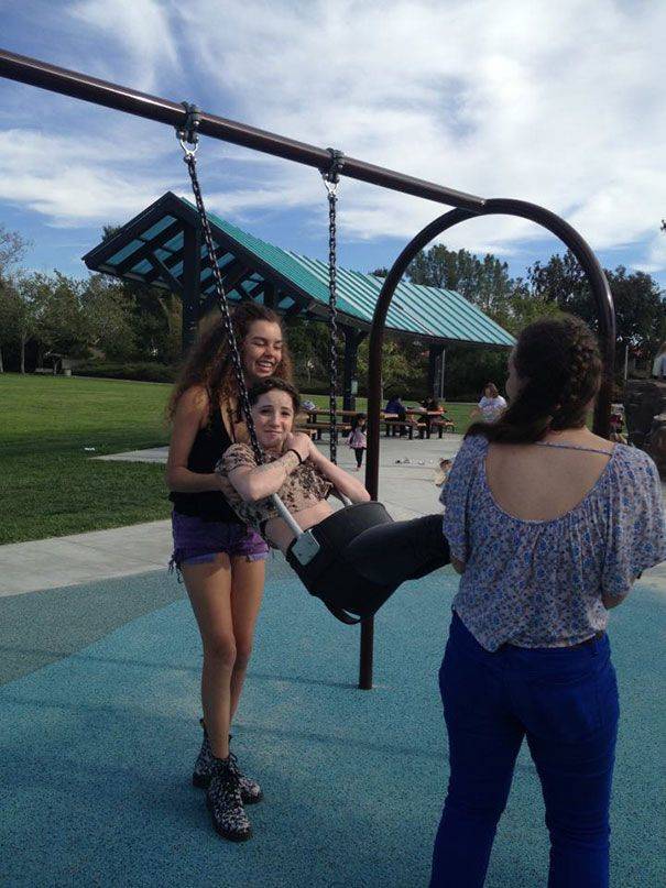 girl stuck in a swing