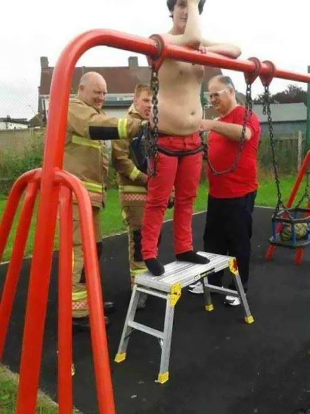 adults stuck in playground equipment