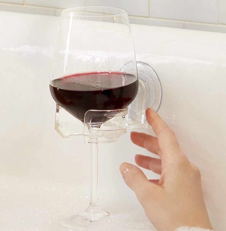 Wine glass holder for the bathtub.