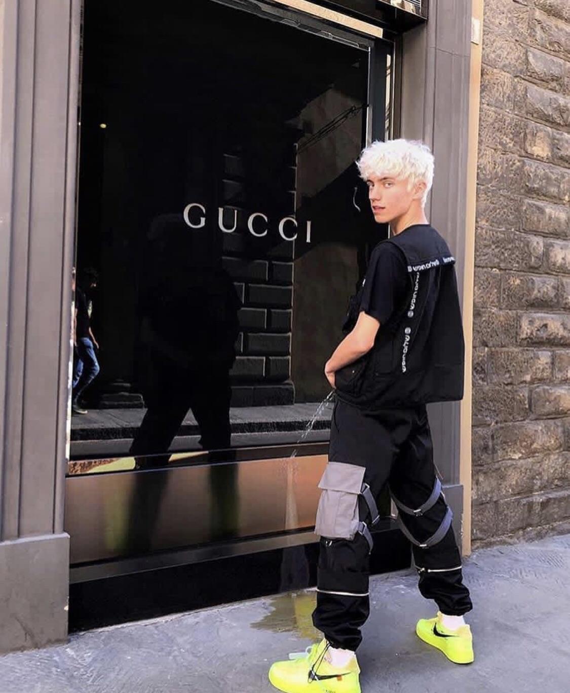 guy peeing on gucci