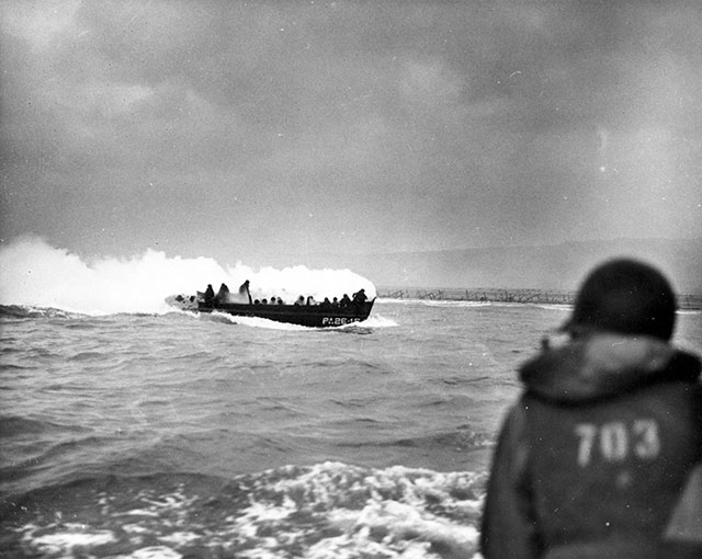 A landing craft from USS Samuel Chase approaches Omaha Beach on D-Day.