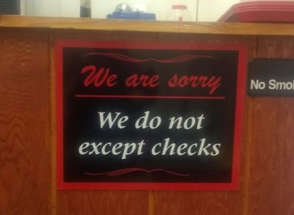 signage - We are sorry No Smol We do not except checks
