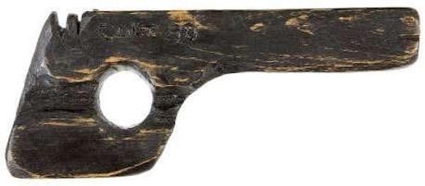 This is the actual wooden gun that John Dillinger famously used to escape from the Crown Point, Indiana jail. It sold for $19,000 at auction. 