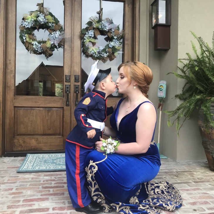 “My boyfriend is a marine and isn’t home to take me to my senior prom...so his little brother stepped in and took his place. I’m so happy!”