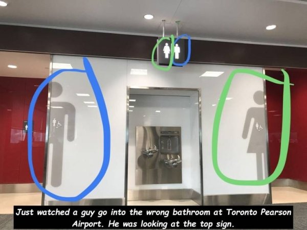 fail crappy design - Just watched a guy go into the wrong bathroom at Toronto Pearson Airport. He was looking at the top sign.