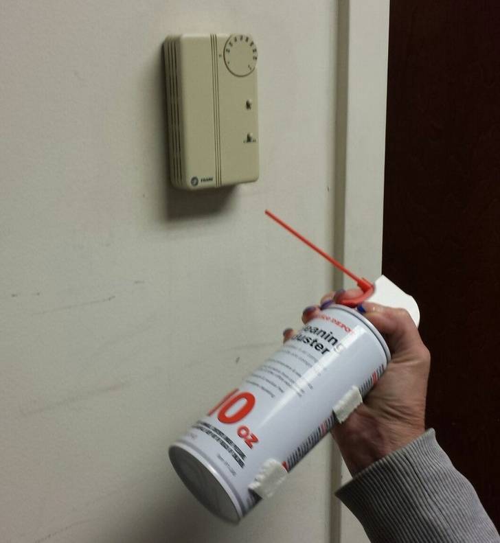 This office doesn't let them adjust the thermostat, but they found a way around it.