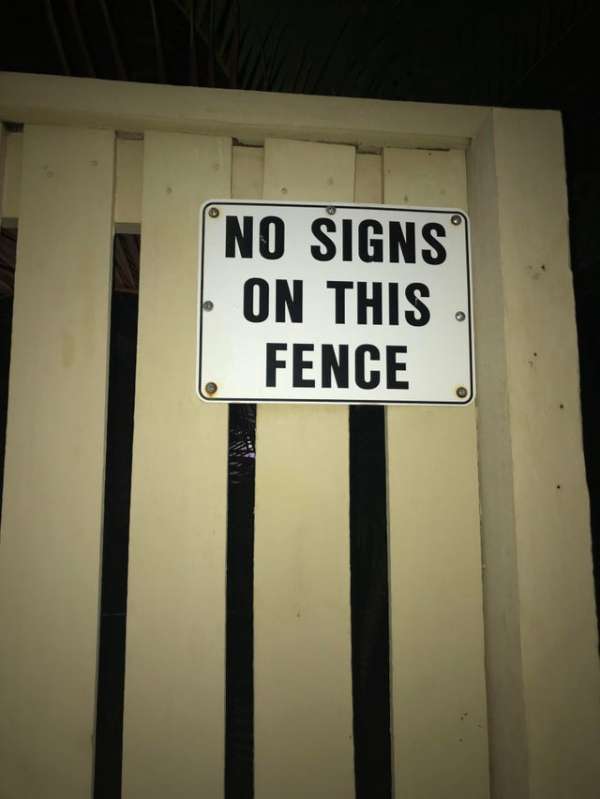 sign - 'No Signs On This Fence
