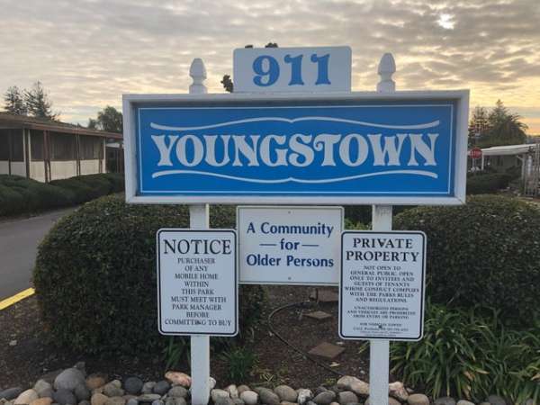 street sign - 911 Youngstown Notice A Community for Older Persons Private Property Tuscita Ofany More Home Within This Park Mlst Met Wit Pakk Manager He Committino To Buy