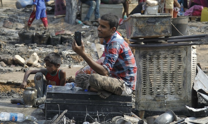 A man calls his wife after losing his house in a fire.