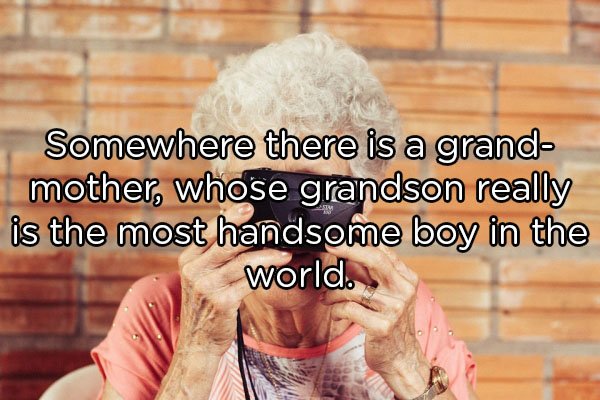 old lady holding camera - Somewhere there is a grand mother, whose grandson really is the most handsome boy in the world.