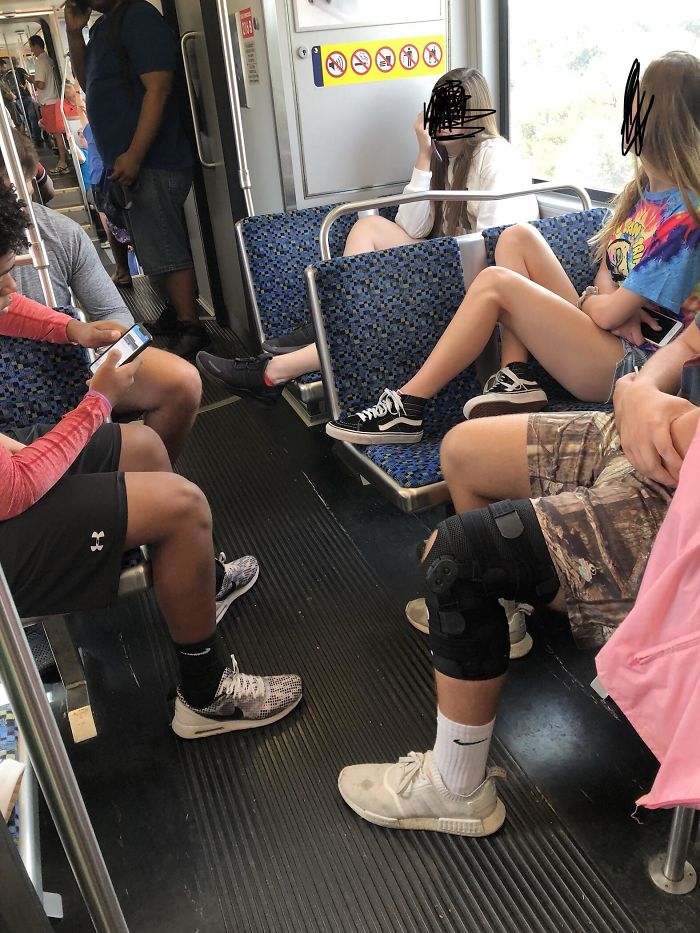teen girls taking up multiple seats on the bus