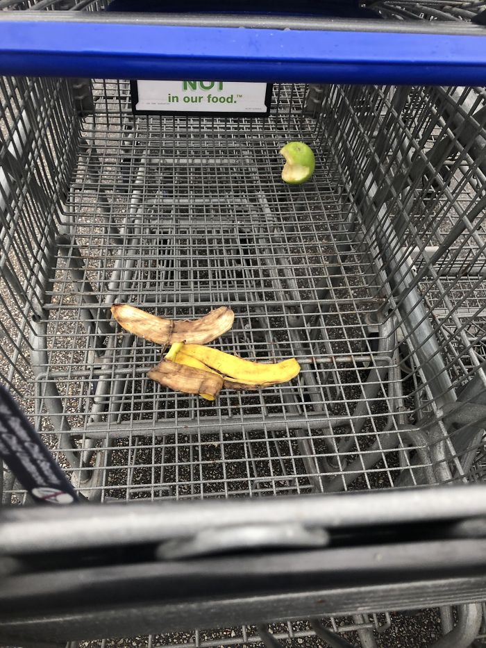 banana peel and apple core leftover in a shopping cart