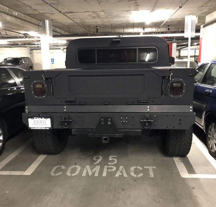 massive car in a compact parking spot