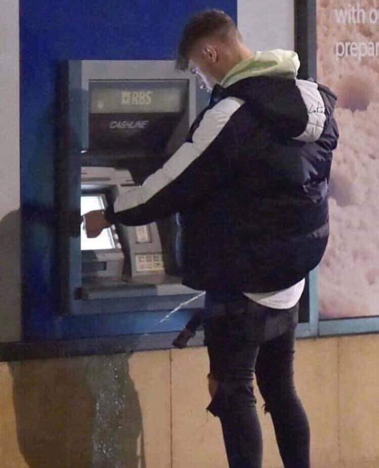 trashy people - drunk guy peeing at the atm