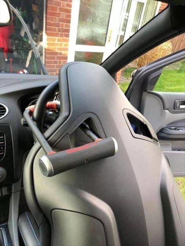 Car seat locked to steering wheel