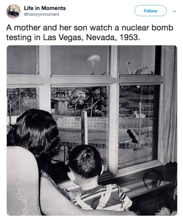 mom and son watching the mushroom cloud - Life in Moments A mother and her son watch a nuclear bomb testing in Las Vegas, Nevada, 1953.