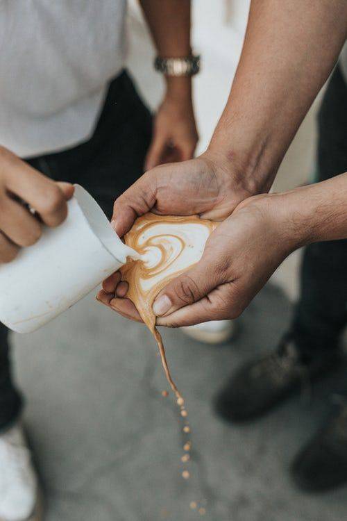 wtf pouring coffee in hands