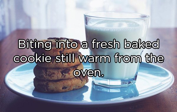 Biting into a fresh baked cookie still warm from the oven.