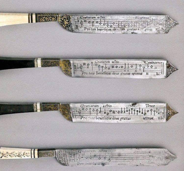 Extremely rare 16th century knives with music to sing at the end of the meal inscribed on them.