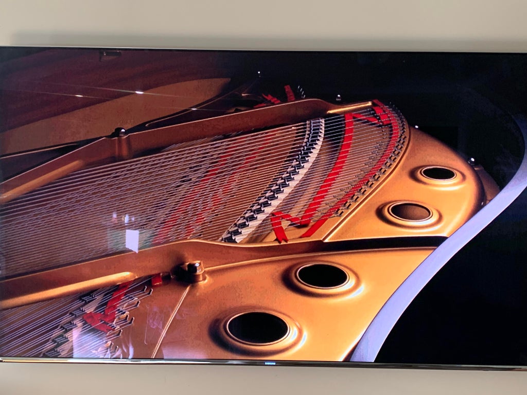 The inside of a grand piano.