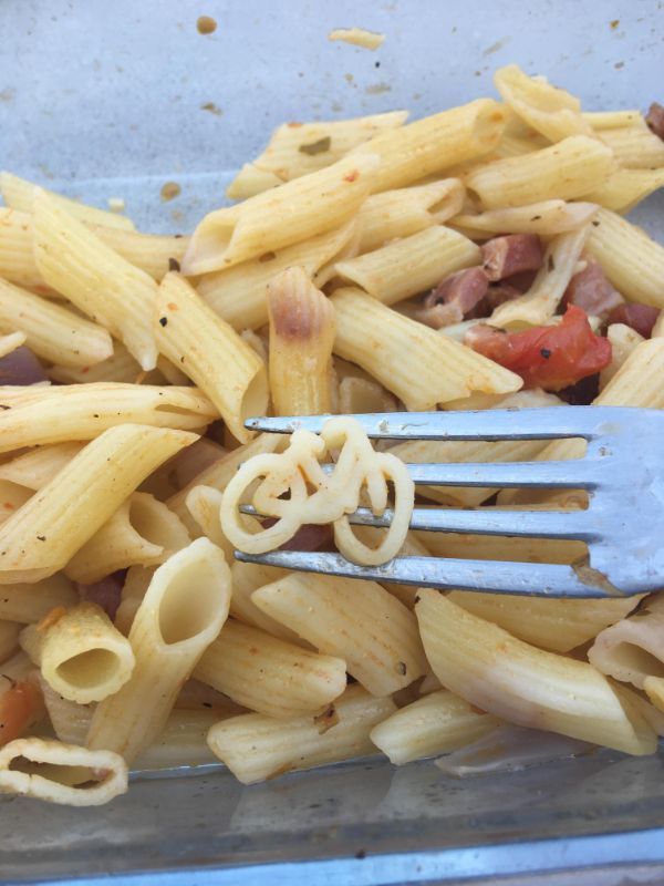 Single piece of bicycle shaped pasta.