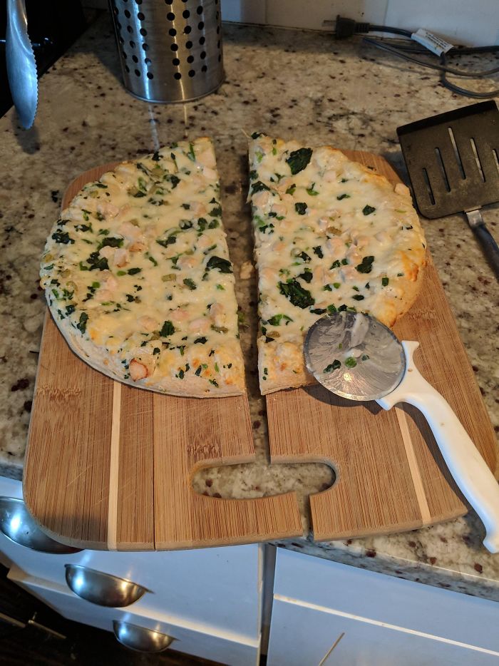 Pizza cutter and cutting board split in half
