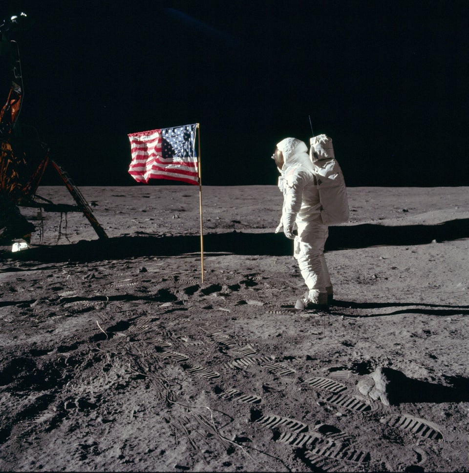 Buzz Aldrin, of the Apollo 11 expedition, saluting the United States flag. Tranquility Base, Moon. July 20, 1969.