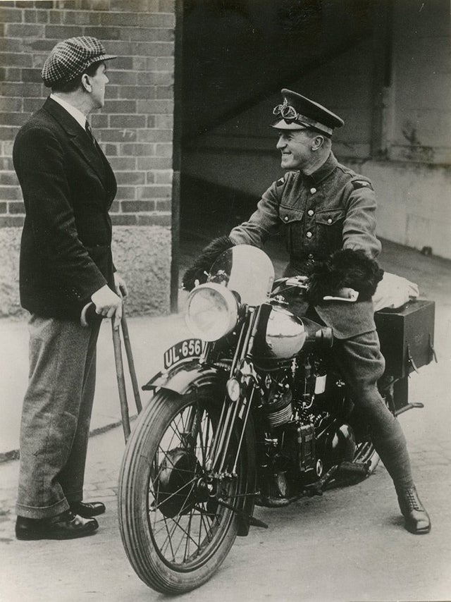 Colonel TE Lawrence (also known as "Lawrence of Arabia") with George Brough, October 1930.