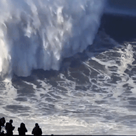 German surfer Sebastian Steudtner rides massive wave in Nazaré, Portugal.
