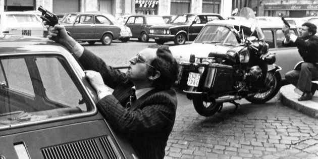 Italian police officers during the Red Brigades attack at the Christian Democracy headquarter in Piazza Nicosia, Rome, 1979.