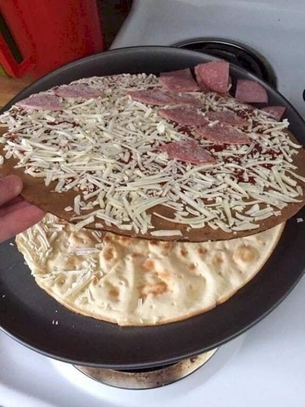 pizza toppings on cardboard