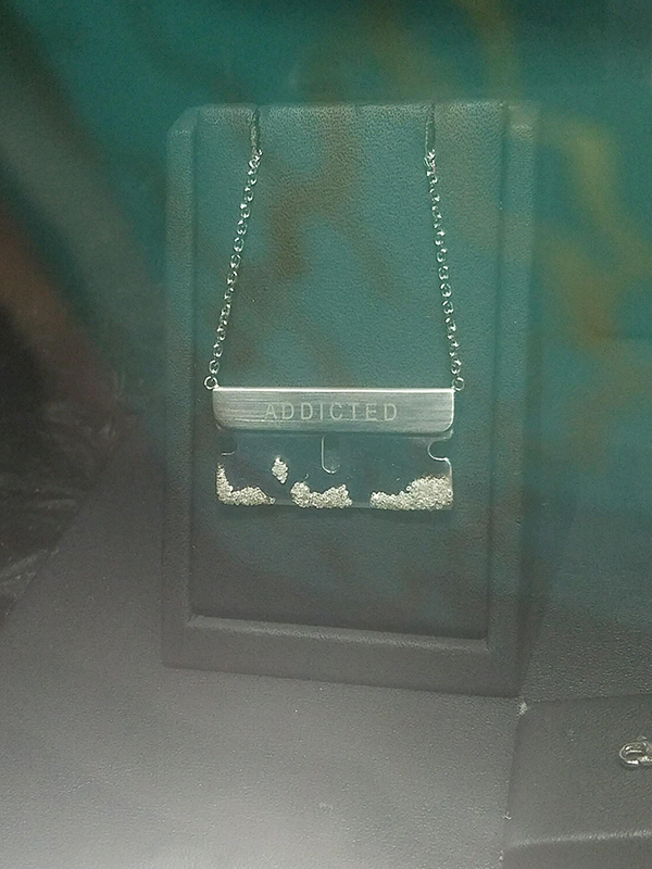 wtf pic cocaine razor necklace