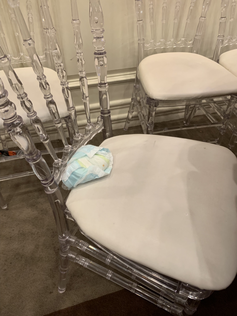dirty diaper left in chair