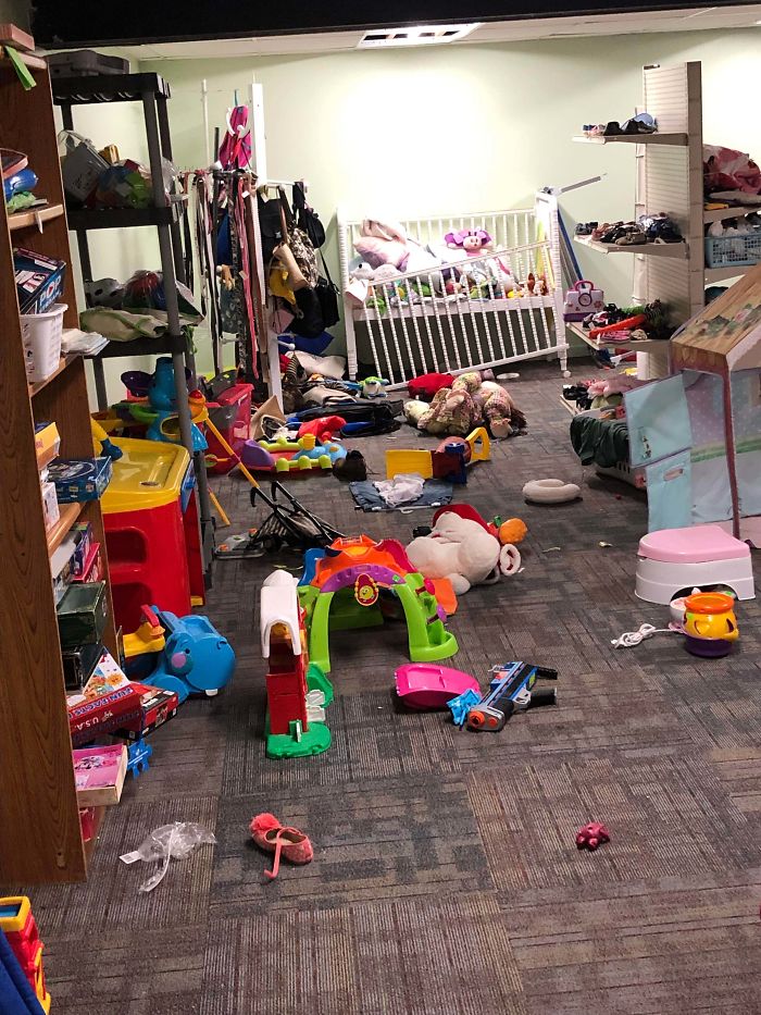 toy room that has been left like a tornador ripped thru there