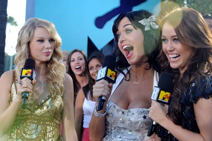 Katy Perry used to keep a lock of Taylor Swift's and Miley Cyrus's hair in her purse.