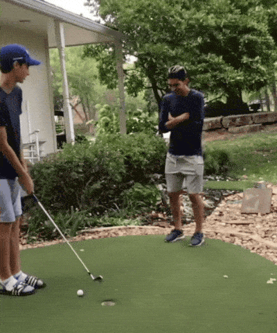 golf shot in the nuts gif